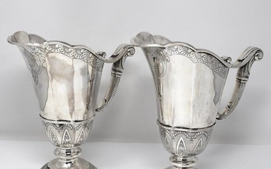 Pair of antique sterling silver water pitchers