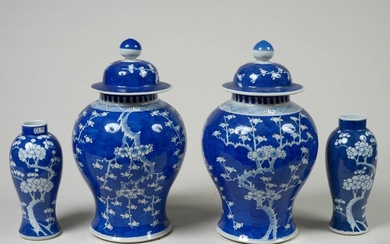 Pair of covered vases and a pair of...