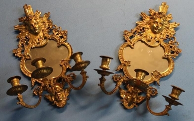 Pair of gilt metal three branch candelabra wall mirrors,...
