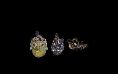 Phoenician Glass Head Pendant Collection