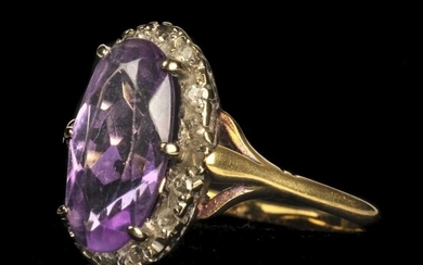 Ring. 18ct gold amethyst and diamond ring