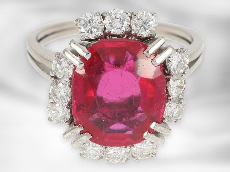 Ring: decorative white gold ring with fine diamonds of approx. 0,96ct and ruby, this probably synthetic, 14K gold
