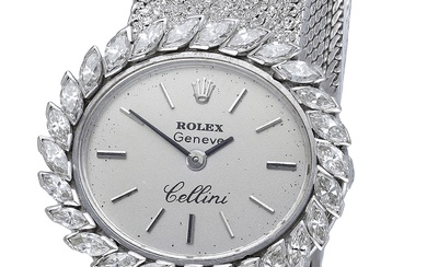 Rolex. A lady’s white gold and diamond-set oval bracelet watch, Ref. 681,...
