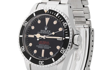 Rolex. Sought after and Desired Sea Dweller “Double Red” Automatic Wristwatch in Steel, Reference 1665, With Black dial, Full-set and Additional Glass and Links.