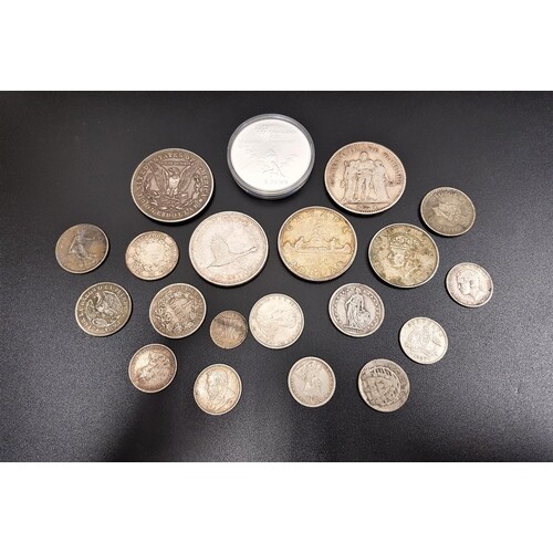 SELECTION OF WORLD SILVER COINS with silver contents ranging...