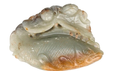 SAGE GREEN JADE CARVING OF A SOLITARY FISH...