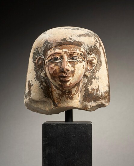 TÊTE DE STATUETTE EN CALCAIRE Art égyptien, Nouvel Empire, 1550 - 1069 av. J.-C.
