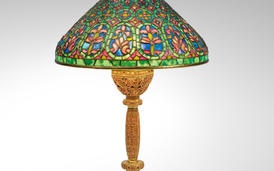 TIFFANY STUDIOS (1899-1930) Venetian Table Lampcirca 1915gilt bronze, leaded glass, shade stamped 'TIFFANY STUDIOS NEW YORK' and '515-5'; base with felt covering on undersideheight 19 3/4in (50cm); diameter of shade 13 1/8in (33cm)