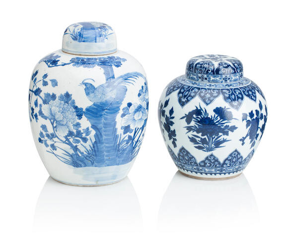 TWO CHINESE BLUE AND WHITE JARS AND COVERS