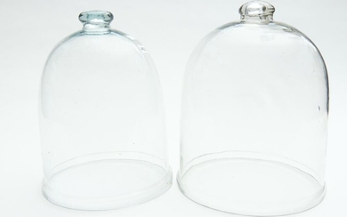 TWO GLASS CLOCHES, 30 CM AND 32 CM HIGH