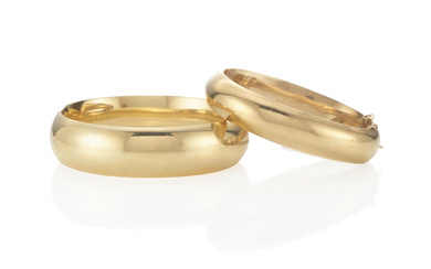 TWO GOLD HINGED BANGLES