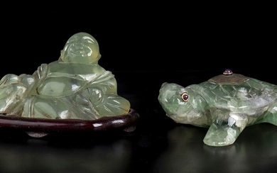 TWO GREEN QUARTZ SCULPTURES China (?), 20th century One depicting...