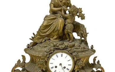 Table clock in bronze with gold patina, nineteenth