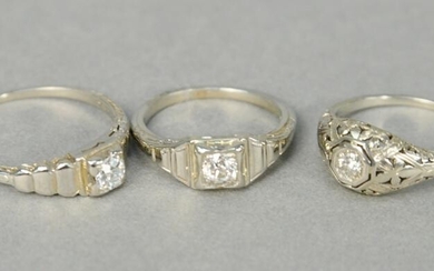 Three 18 karat white gold rings set with diamonds, 7.5
