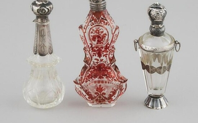 Three Dutch Silver Mounted Glass Perfume Bottles and a