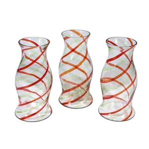 Three glass hurricane shades and four candlesticks Cole and...