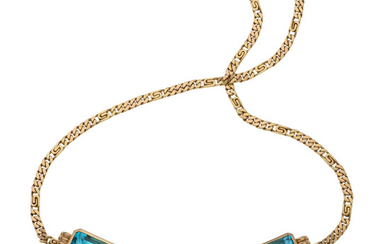 Topaz, Diamond, Gold Necklace The necklace features emerald-cut blue...
