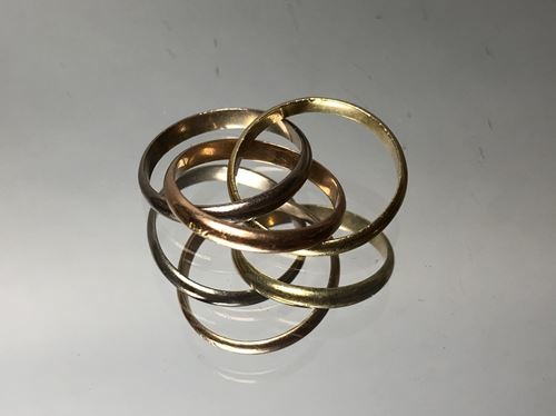 Trilogy ring, three golds, hallmark A and titled...