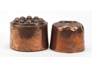 Two 19th century copper jelly moulds, the largest 15cm in di...