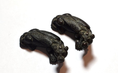 Two Chinese scroll bronze weights