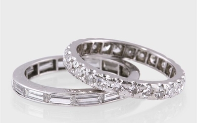 Two diamond and platinum eternity band rings one set...