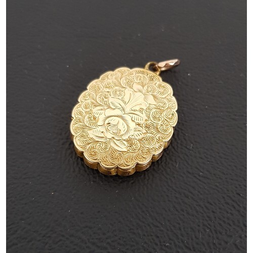 UNMARKED GOLD LOCKET PENDANT with engraved decoration overal...