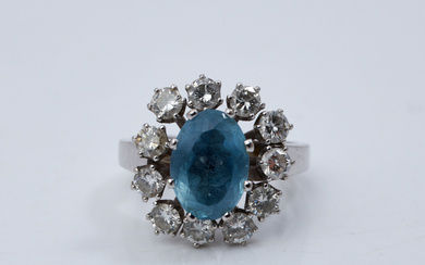 W A BOLIN, RING, 18k white gold, oval-cut aquamarine 2,14 ct, bordered by 11 diamonds in total approx. 0,57 ct, Stockholm, 1900's.