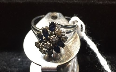 White gold flower ring set with 6 small...