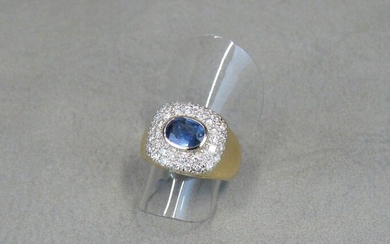 A yellow gold (eagle) ring, set with a sapphire in...