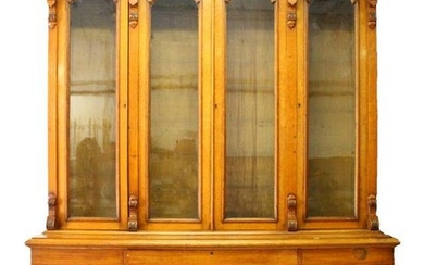 A VICTORIAN OAK LIBRARY BOOKCASE, with a moulded