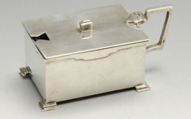 An Art Deco silver mustard pot.