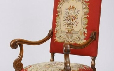 19th c. carved walnut armchair in needlepoint