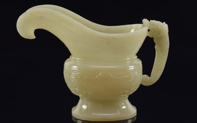 19th/20th century Chinese carved jade wine cup. Dragon handle with archaic carved taotie mask
