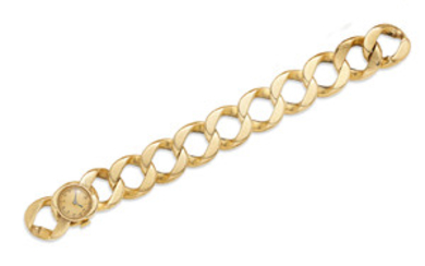 A 14k gold curb link bracelet wristwatch