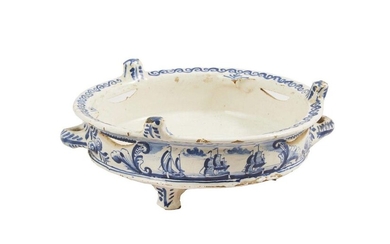 22-Frise (Holland): a large earthenware "komfoor" with blue monochrome decoration...