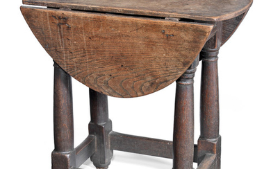 A boarded elm and joined oak table-stool, English, circa 1650