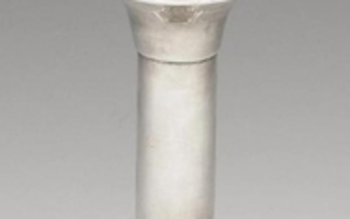 An early twentieth century silver mounted candlestick
