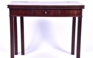 A George III mahogany fold over card table the single front drawer with brass ring drop handle, supported on four straight...