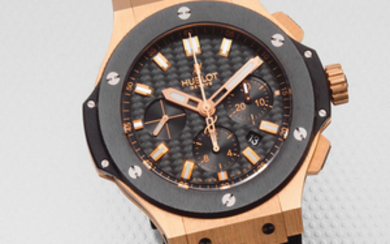 Hublot. An oversized 18K rose gold and titanium automatic calendar chronograph wristwatch