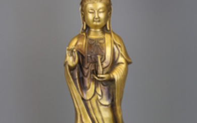 A large Chinese gilt bronze figure of the goddess Guanyin, H. 47cm.