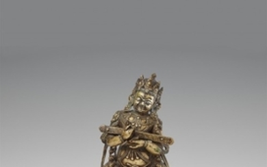 A Tibetan silver-inlaid bronze figure of Maha ...