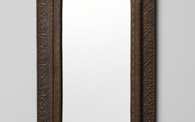 A LARGE CONTINENTAL REPOUSSE MIRROR