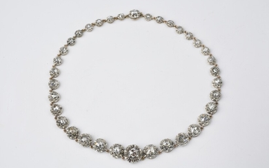 An 18k gold, silver, and diamond rivière collier