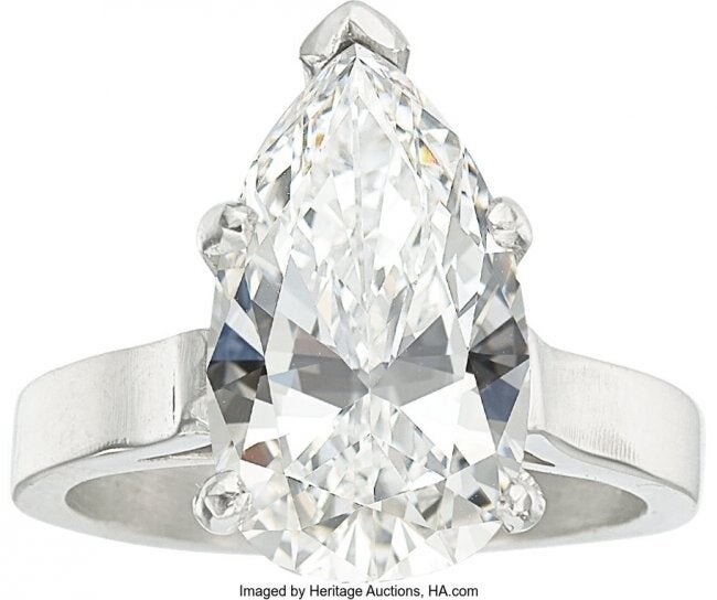 55222: Diamond, Platinum Ring The ring features a pea