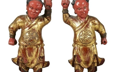 A pair of Chinese lacquered and gilt wood figures, 19th