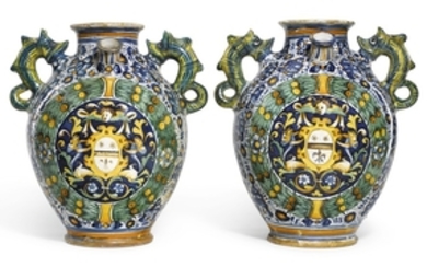 A pair of Italian maiolica armorial wet drug jars, Montelupo, circa 1560