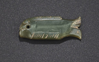 A SMALL GREYISH-GREEN JADE FISH-FORM PENDANT, LATE SHANG-EARLY WESTERN ZHOU DYNASTY, 12TH-11TH CENTURY BC