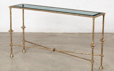 A Brutalist gilt iron and glass console table