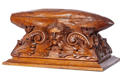 A CARVED BLACKWOOD BOX ATTRIBUTED TO GORDON CUMMINGS (1894-1972)
