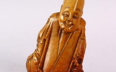 A CHINESE CARVE3D SOAPSTONE FIGURE OF A JOLLY MAN, in